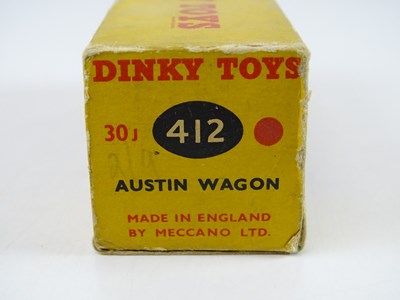 Lot 184 - A DINKY 412 Austin Wagon in maroon with red...