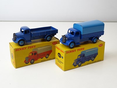 Lot 198 - A pair of DINKY 413 Austin Covered Wagons in...