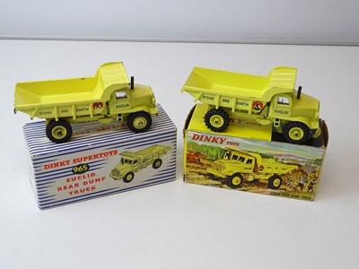 Lot 202 - A pair of DINKY 965 Euclid Dump Trucks, one in...