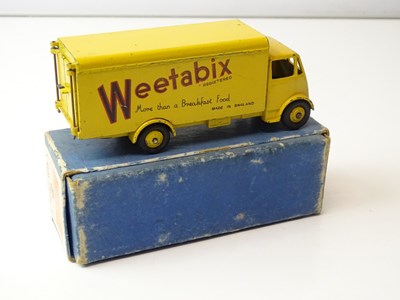 Lot 205 - A DINKY 514 Guy Van in yellow 'Weetabix' - G...