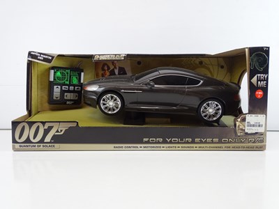 Lot 213 - A group of James Bond radio control Aston...