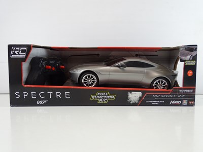 Lot 213 - A group of James Bond radio control Aston...