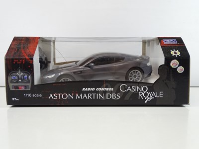 Lot 213 - A group of James Bond radio control Aston...