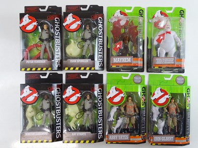 Lot 215 - A group of Ghostbusters related action figures,...