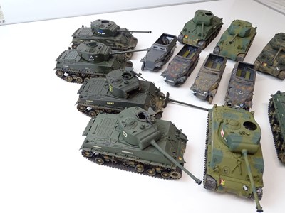 Lot 221 - A quantity of kit built tanks and military...