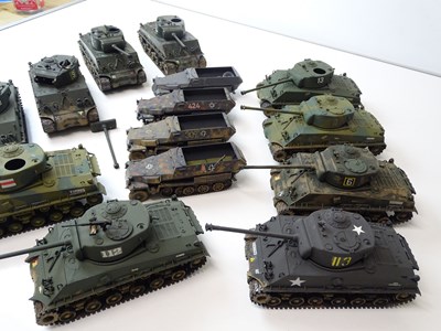 Lot 221 - A quantity of kit built tanks and military...