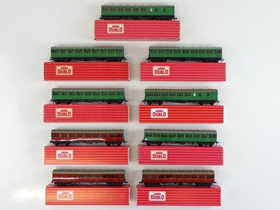 Lot 323 - A group of HORNBY DUBLO OO gauge suburban...