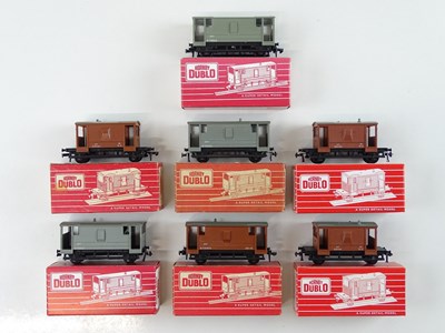 Lot 357 - A group of HORNBY DUBLO OO gauge Brake vans,...