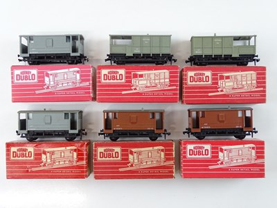 Lot 359 - A group of HORNBY DUBLO OO gauge Brake vans,...