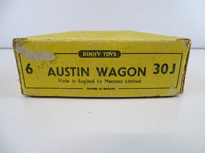 Lot 40 - A DINKY 30J Austin Wagon trade box complete...
