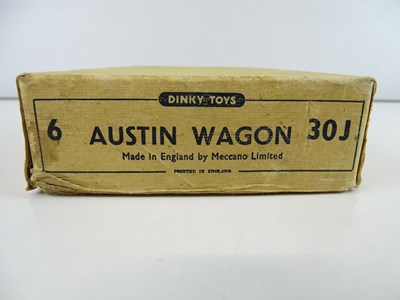 Lot 50 - A DINKY 30J Austin Wagon trade box complete...