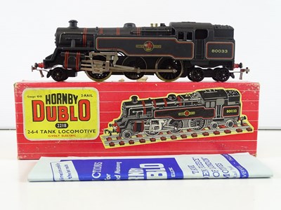 Lot 518 - A HORNBY DUBLO 2218 OO gauge class 4MT steam...