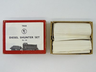 Lot 521 - A TRIX TWIN 244 Diesel Shunter set containing...