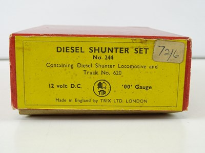 Lot 521 - A TRIX TWIN 244 Diesel Shunter set containing...