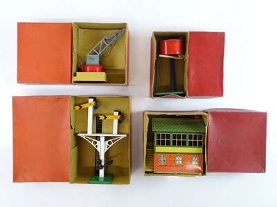 Lot 614 - A group of HORNBY O gauge accessories...