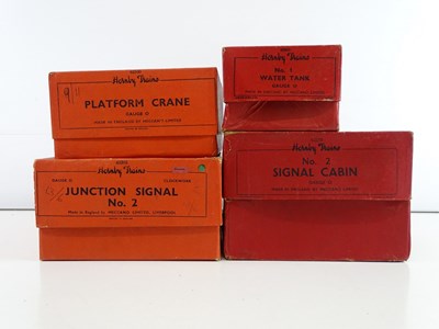 Lot 614 - A group of HORNBY O gauge accessories...