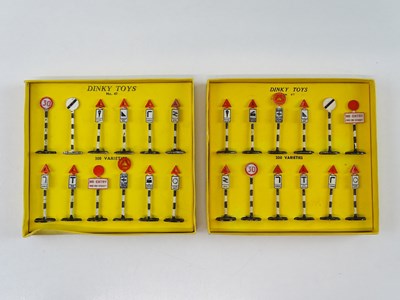 Lot 62 - A pair of DINKY No. 47 Road Signs boxed sets,...