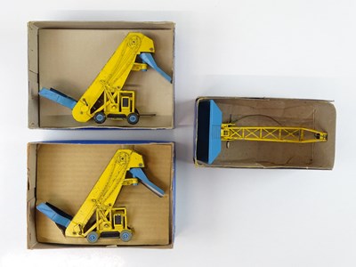 Lot 64 - A pair of DINKY 564 Elevator Loaders together...