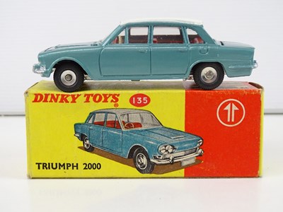 Lot 82 - A DINKY 135 Triumph 2000 car in blue/white -...