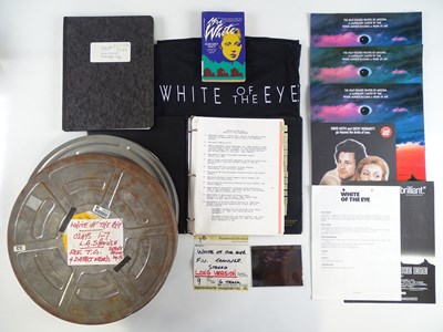 Lot 453 - WHITE OF THE EYE (1987) - 2x film reel holders...