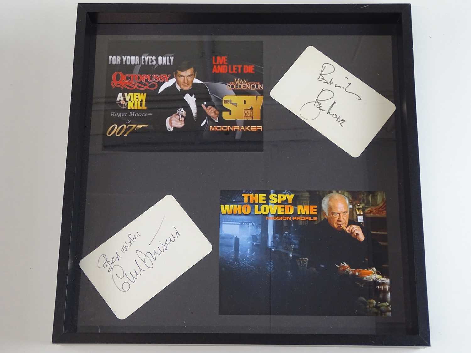 Lot 207 - JAMES BOND: A framed and glazed display of 007...