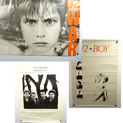 Lot 512 - A group of three U2 promotional album / single...