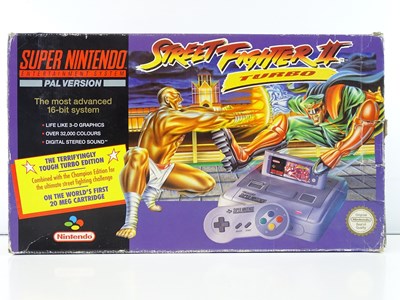 Lot 17 - Super Nintendo Entertainment System (SNES)...