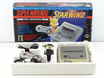 Lot 18 - Super Nintendo Entertainment System (SNES)...