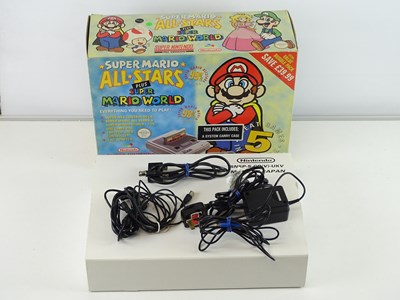 Lot 51 - Super Nintendo Entertainment System (SNES)...