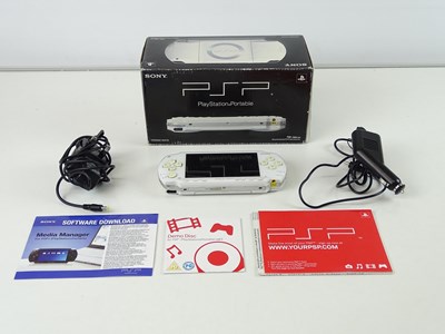 Lot 99 - Playstation Portable 'Ceramic White' colour -...