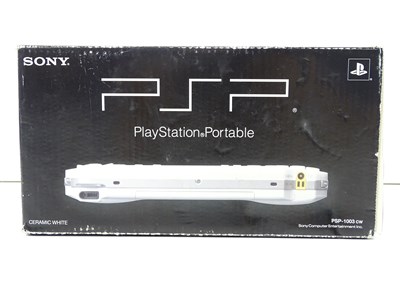 Lot 99 - Playstation Portable 'Ceramic White' colour -...