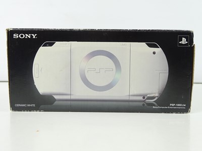 Lot 99 - Playstation Portable 'Ceramic White' colour -...