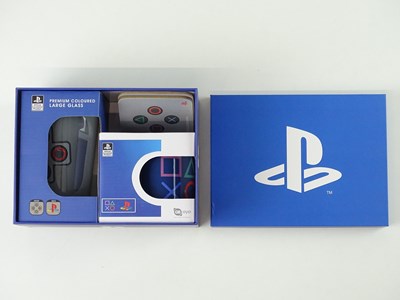 Lot 100 - A selection of Playstation items including a...