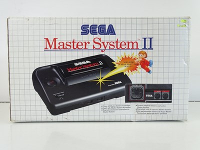Lot 104 - Sega Master System II video games console with...