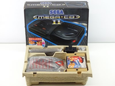 Lot 124 - Sega Mega-CD II an add on unit designed to be...