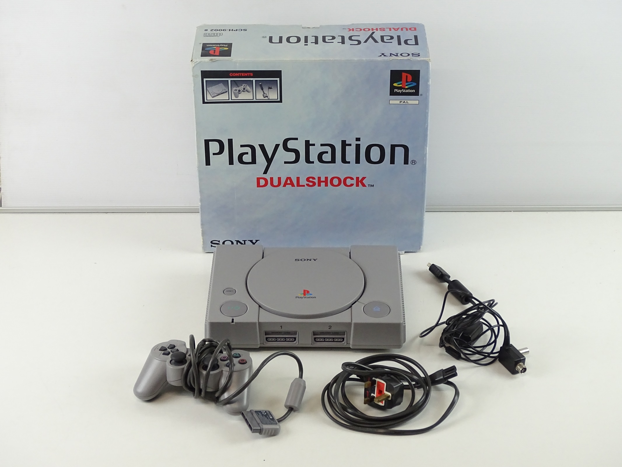 Lot 137 - Playstation original console including