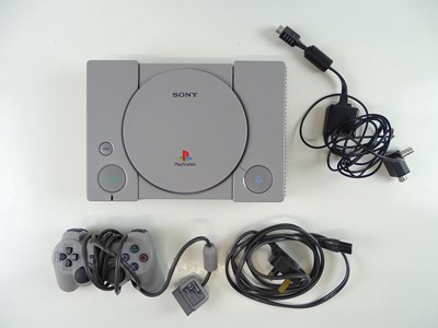 Lot 137 - Playstation original console including...