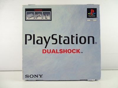 Lot 137 - Playstation original console including...