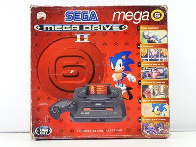 Lot 142 - Sega Mega Drive II console Mega 6 pack -...