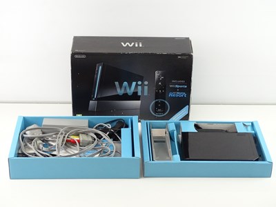 Lot 145 - Wii console, Black version with Sports Resort...