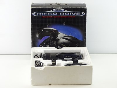 Lot 156 - Sega Mega Drive console - released in 1988 -...