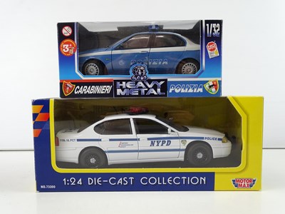 Lot 1 - A mixed group of 1:18 and 1:24 scale diecast...