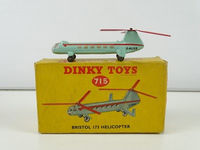 Lot 100 - A pair of DINKY helicopters comprising a 715...