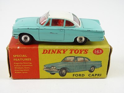 Lot 110 - A pair of DINKY toys cars comprising a 136...