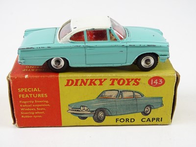 Lot 110 - A pair of DINKY toys cars comprising a 136...