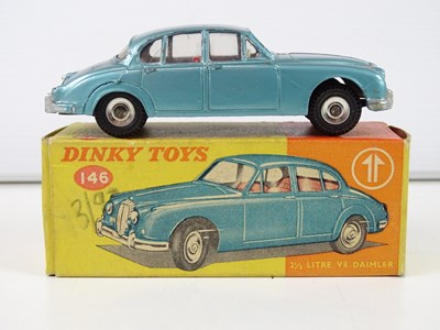 Lot 112 - A group of DINKY cars comprising a 146, 150...