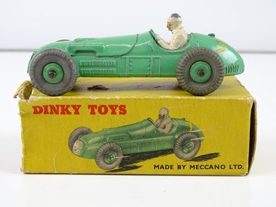 Lot 116 - A group of DINKY racing cars comprising a 23J,...