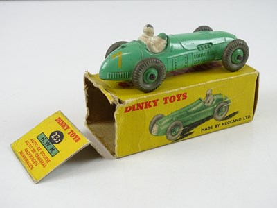 Lot 116 - A group of DINKY racing cars comprising a 23J,...