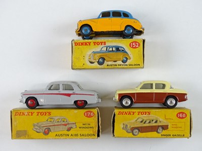 Lot 118 - A group of DINKY cars comprising a 152, 168...