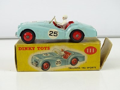 Lot 122 - A group of DINKY sports cars comprising a 108,...